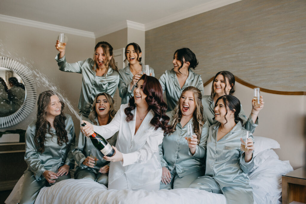 the ritz carlton sarasota wedding
bridesmaids popping champagne